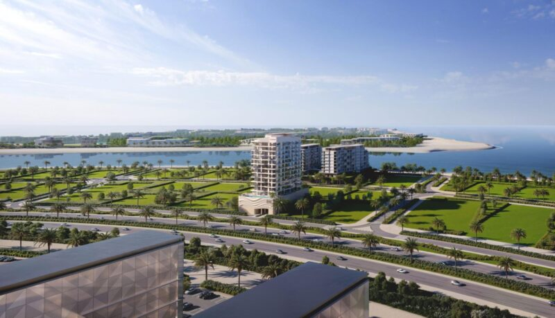 Luxury waterfront apartment balcony overlooking Dubai skyline and coastline